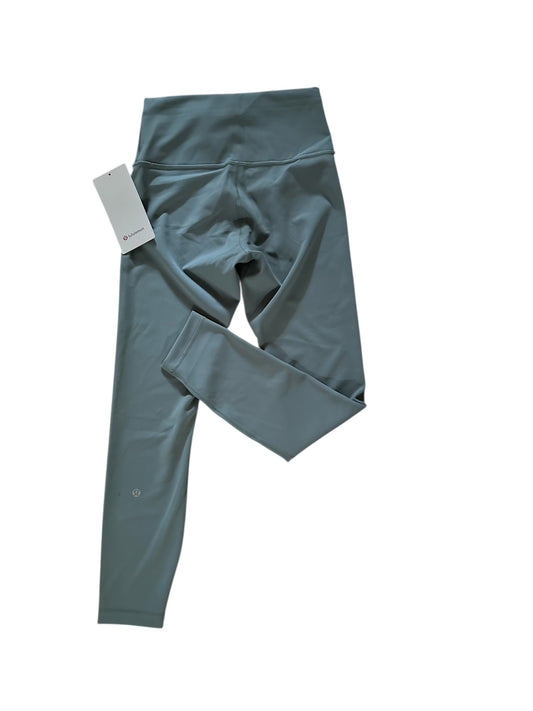 GREEN LULULEMON WUNDER TRAIN LEGGINGS, 6