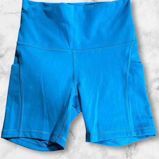 TEAL LULULEMON SHORTS, 6